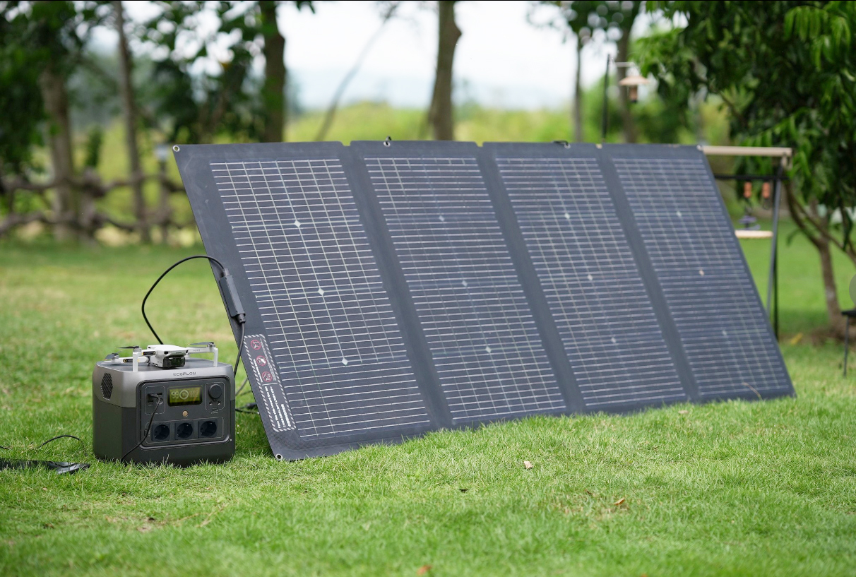 A solar panel connected to an EcoFlow RIVER 2 Max portable power station or solar battery.